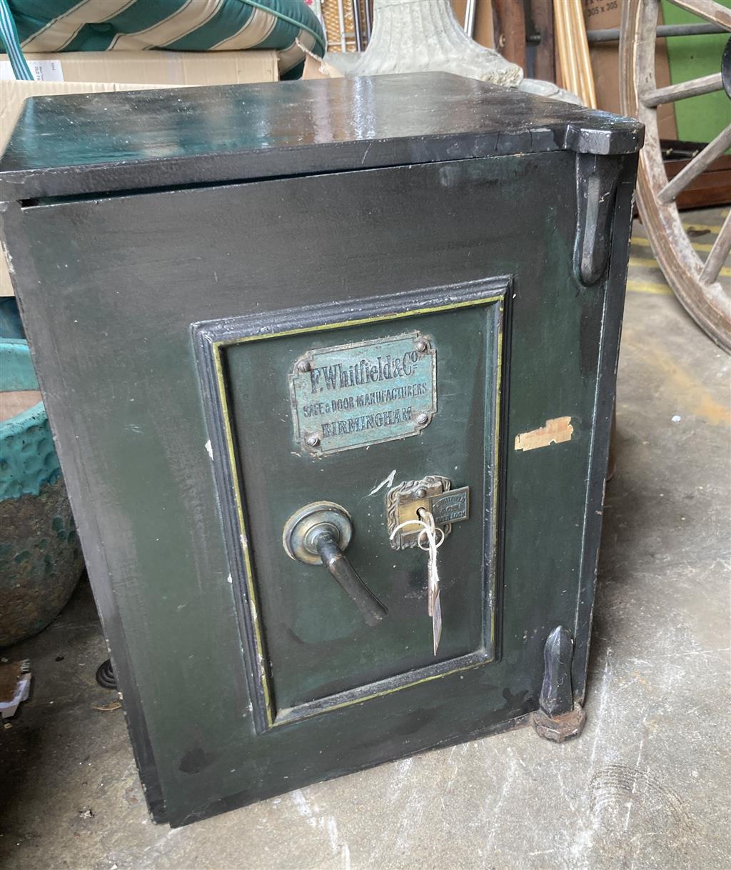 F. Whitfield & Co. - A Victorian cast iron safe, with key, width 60cm, depth 46cm, height 41cm